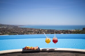 Seasonal outdoor pool, pool loungers