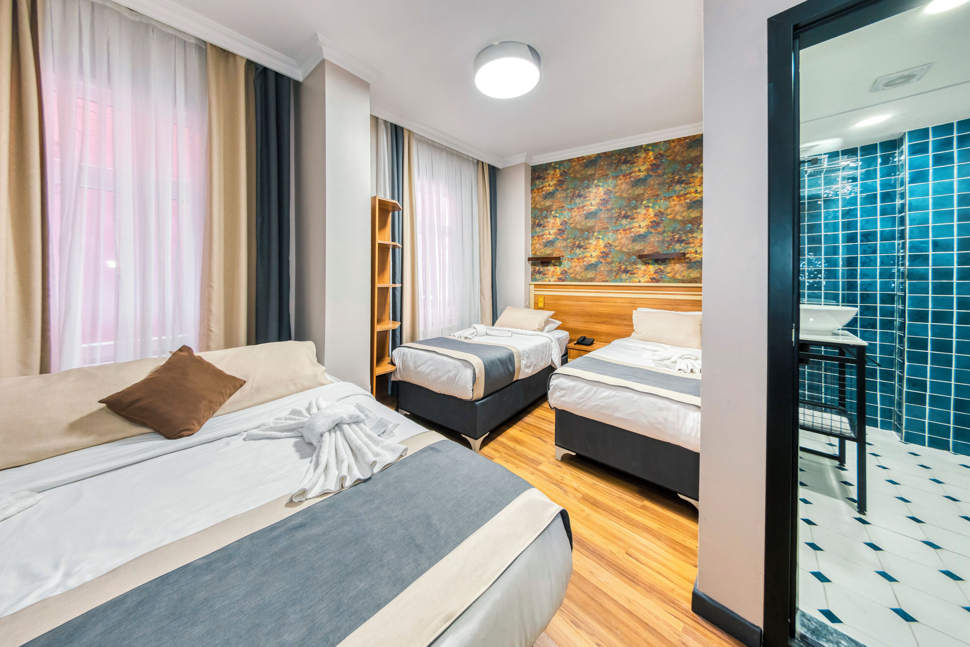 Minibar, in-room safe, iron/ironing board (on request), free WiFi