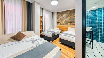 Minibar, in-room safe, iron/ironing board (on request), free WiFi
