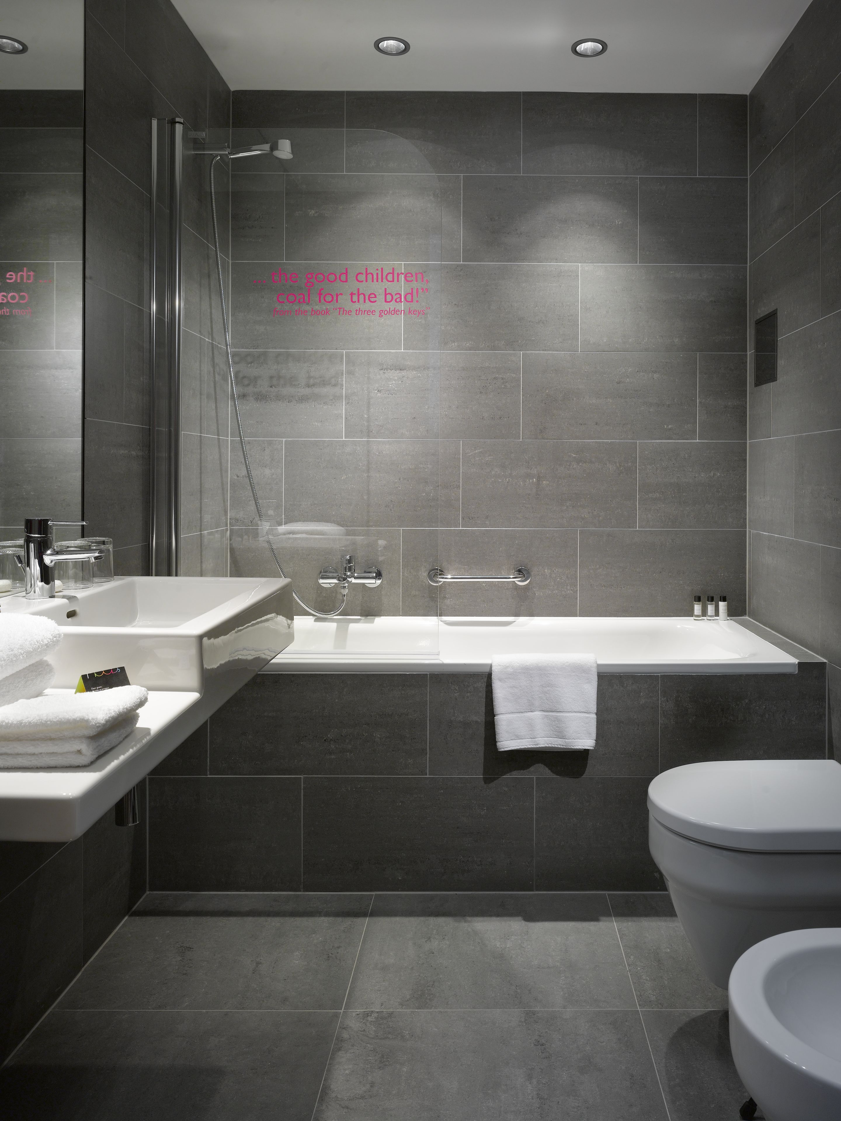 bathtub, free toiletries, hair dryer, bidet