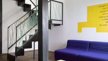 Suite | 1 dormitorio, ropa de cama de alta calidad, minibar y caja fuerte