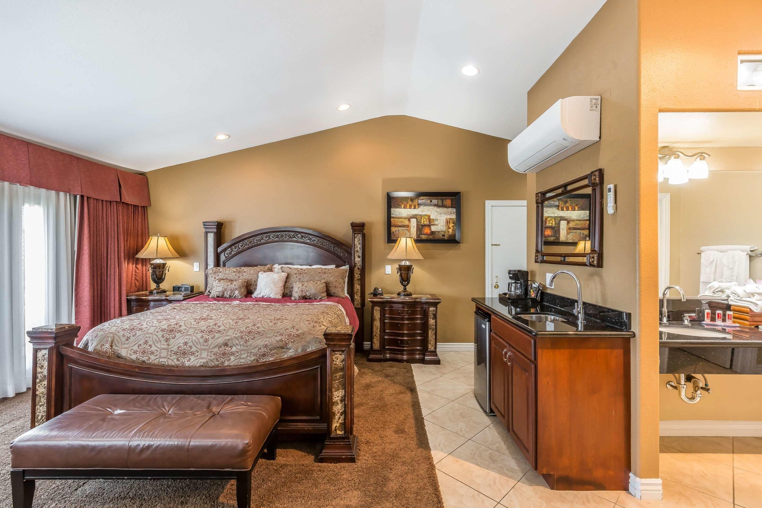 Suite, 1 King Bed, Non Smoking | Pillowtop beds, desk, blackout drapes, iron/ironing board