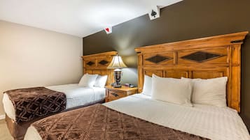 Pillowtop beds, desk, blackout drapes, iron/ironing board