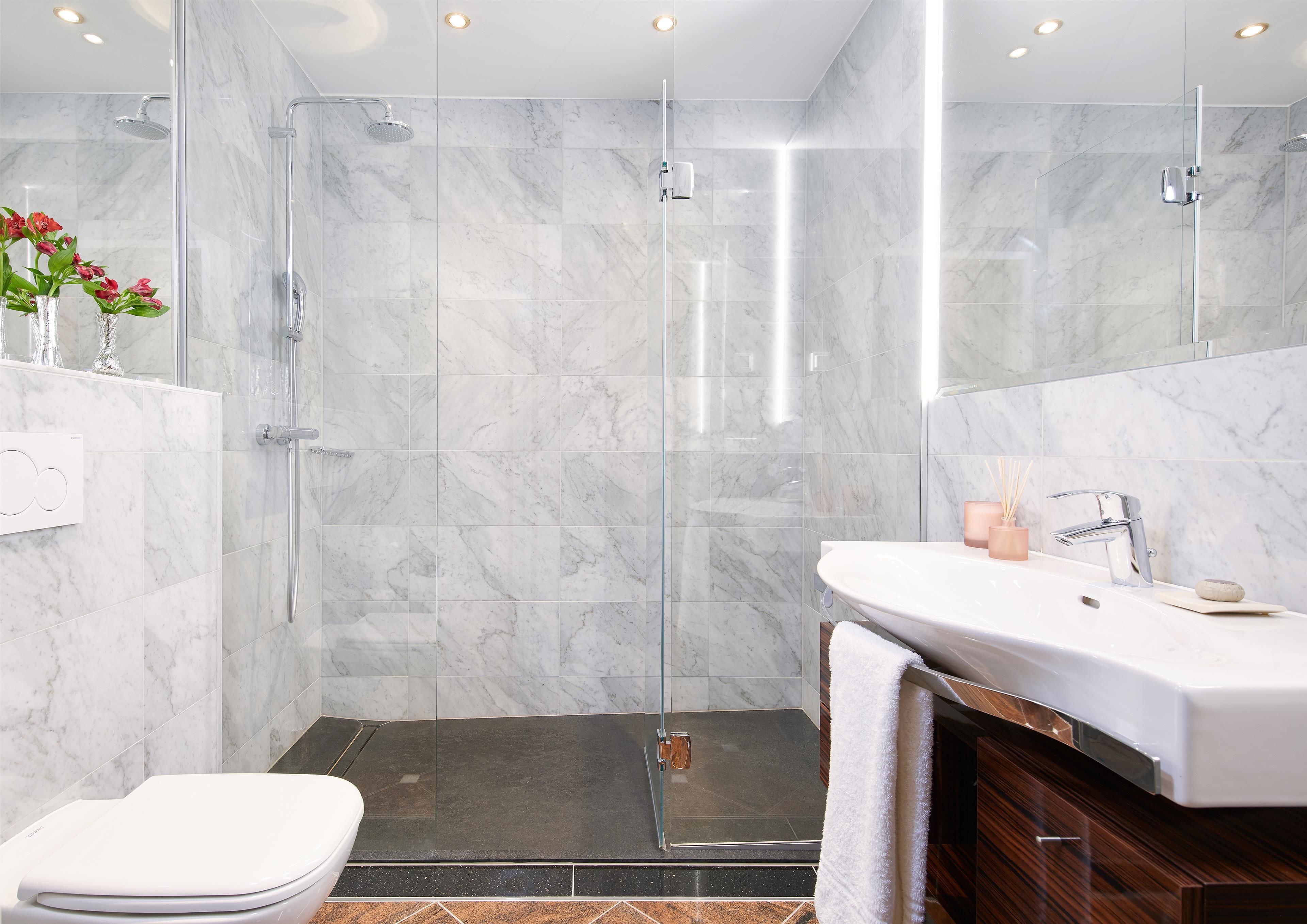 shower, eco-friendly toiletries, hair dryer, towels