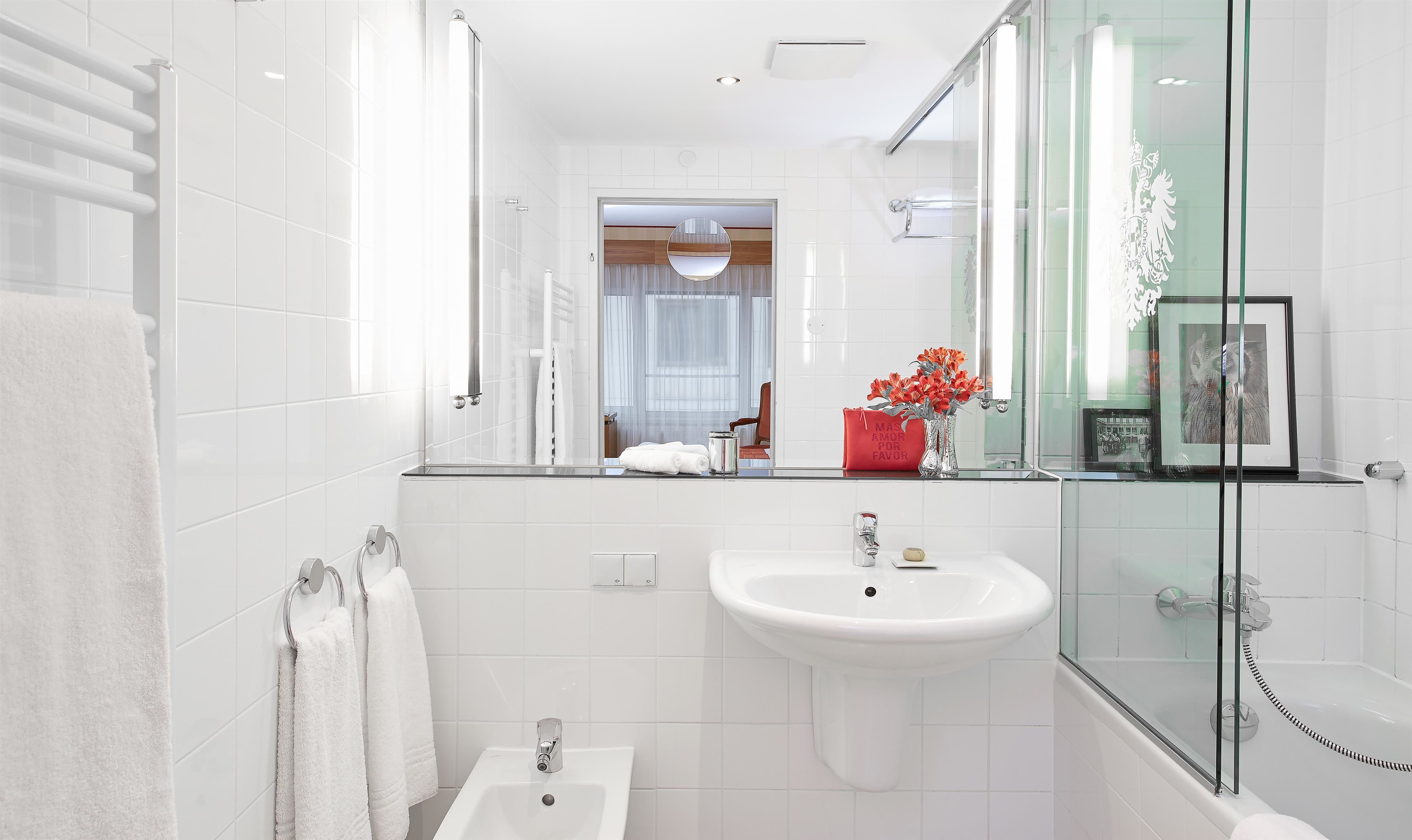 shower, eco-friendly toiletries, hair dryer, towels