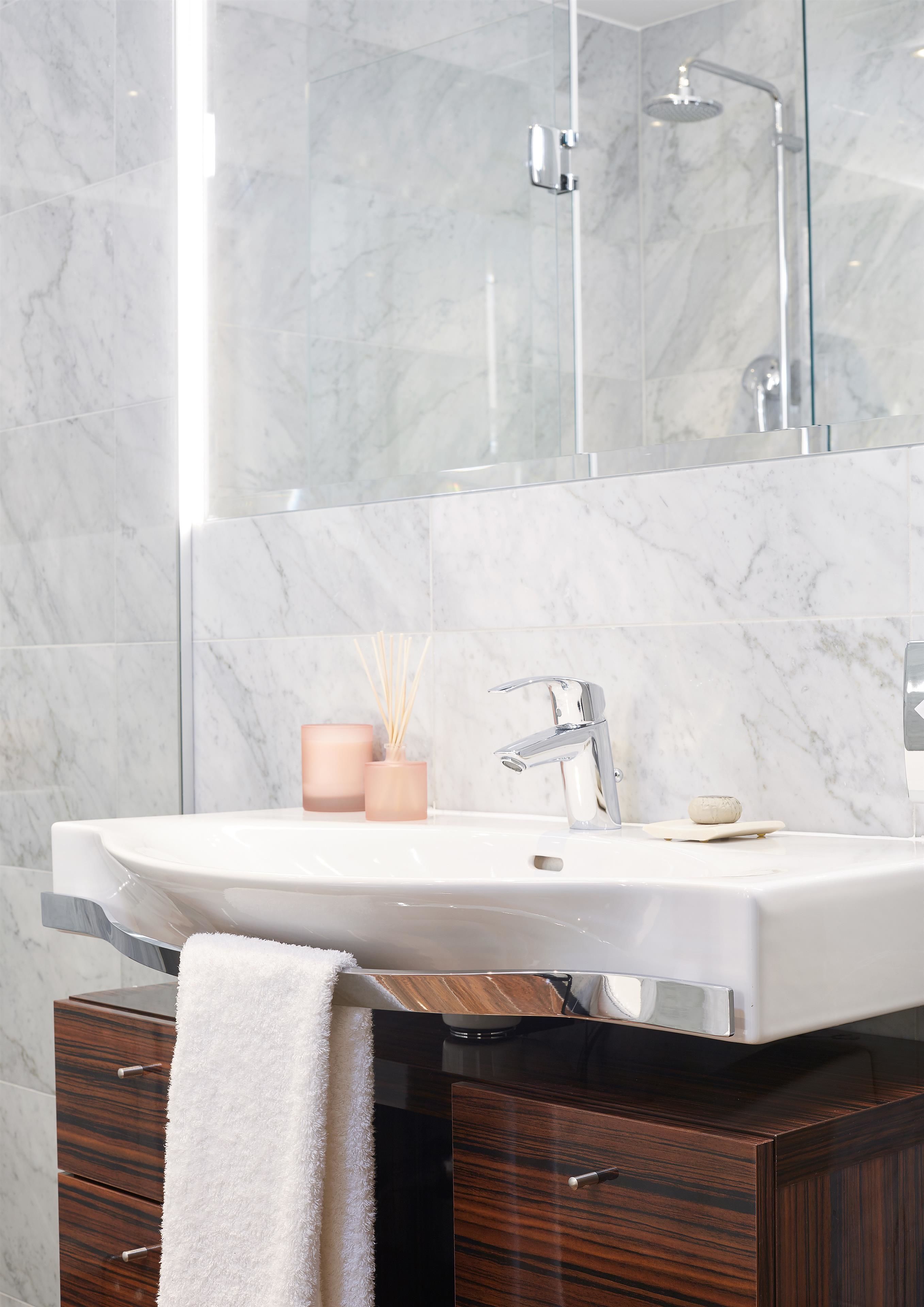 shower, eco-friendly toiletries, hair dryer, towels