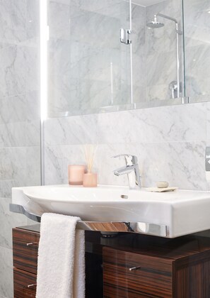 Shower, eco-friendly toiletries, hair dryer, towels