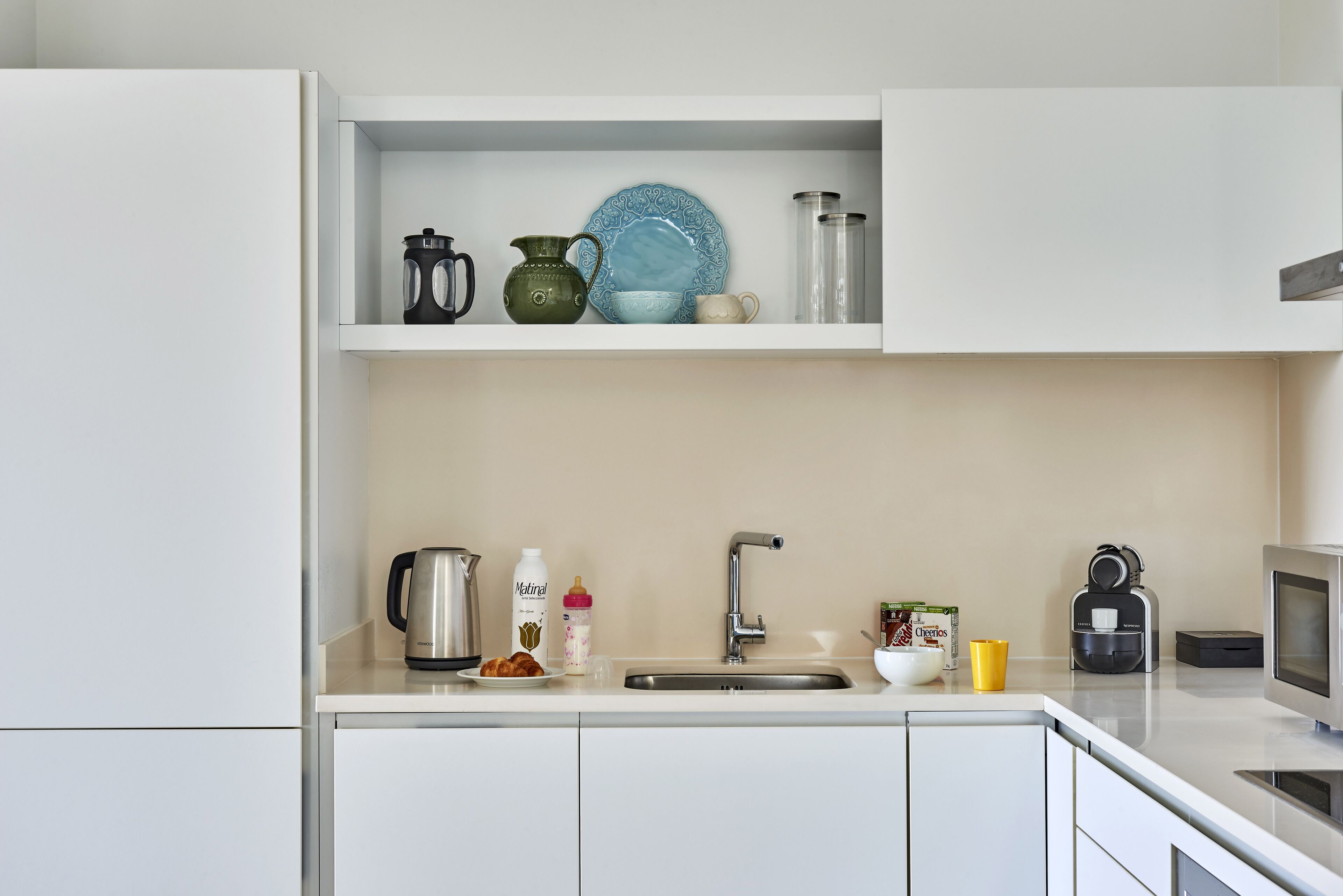 espresso maker, coffee/tea maker, electric kettle, high chair