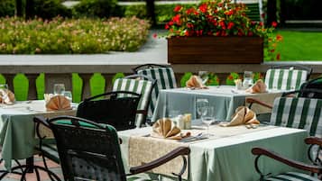 Breakfast, dinner served; international cuisine, garden views