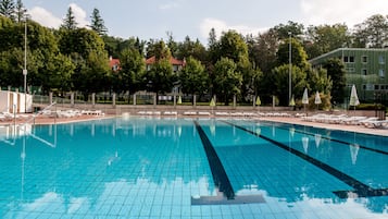 Indoor pool, seasonal outdoor pool, pool umbrellas, pool loungers