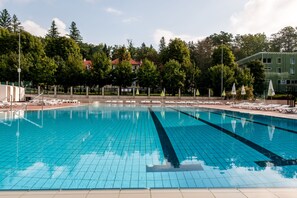 Indoor pool, seasonal outdoor pool, pool umbrellas, pool loungers