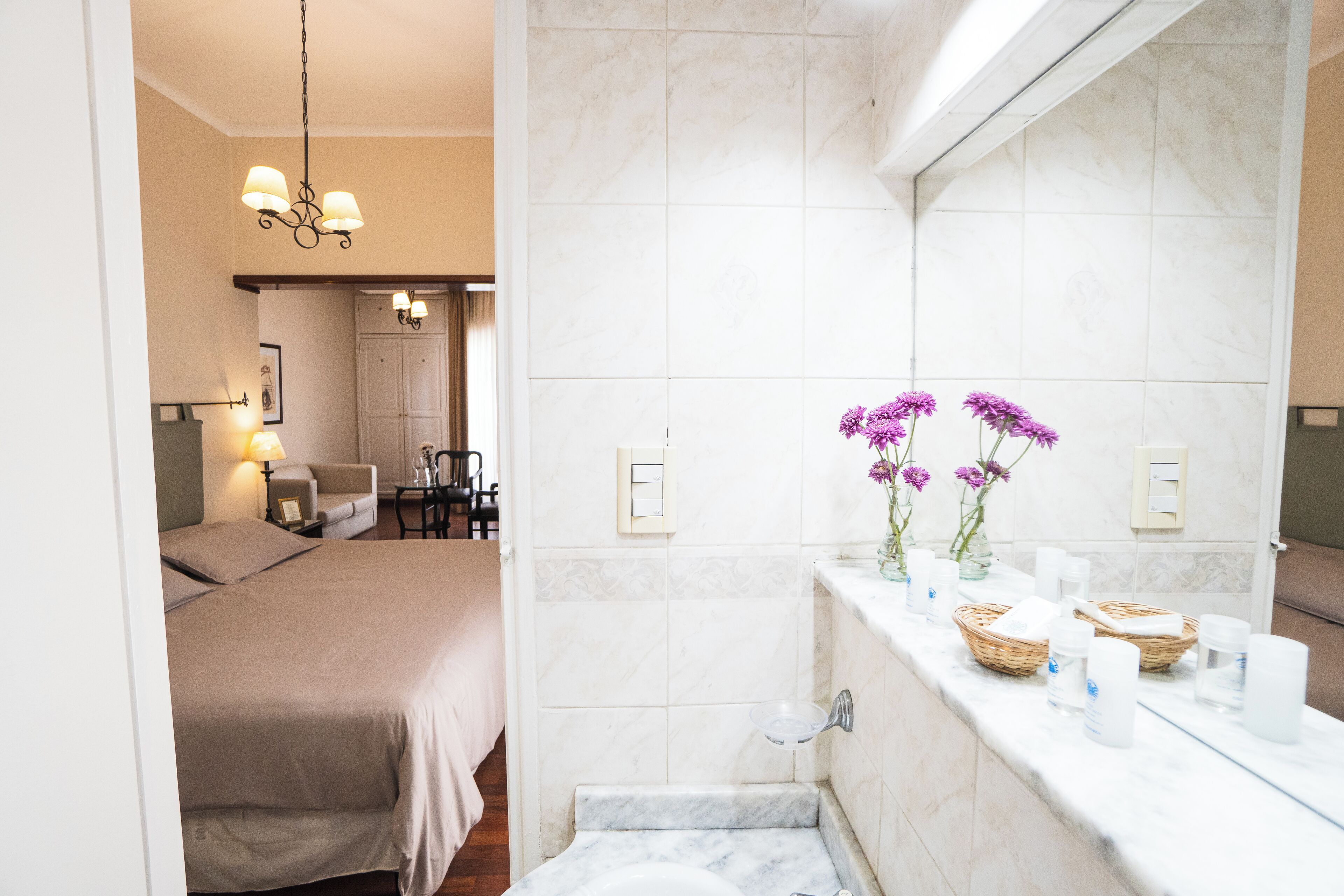 luxury studio suite | bathroom | free toiletries, hair dryer, bidet, towels