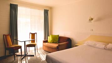 Minibar, desk, laptop workspace, blackout curtains