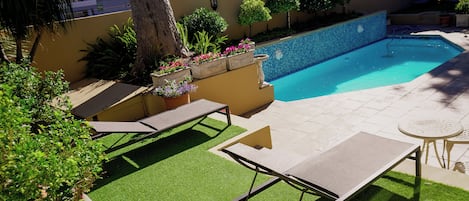 Outdoor pool, pool umbrellas, pool loungers