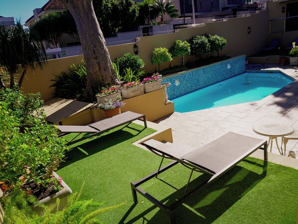 Outdoor pool, pool umbrellas, pool loungers