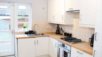 Standard Apartment, 2 Bedrooms | Private kitchen | Fridge, microwave, oven, dishwasher