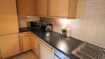 Standard Apartment, 2 Bedrooms | Private kitchen | Fridge, microwave, oven, dishwasher