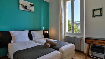 Chambre avec lits jumeaux, côté jardin | Literie de qualité supérieure, coffres-forts dans les chambres