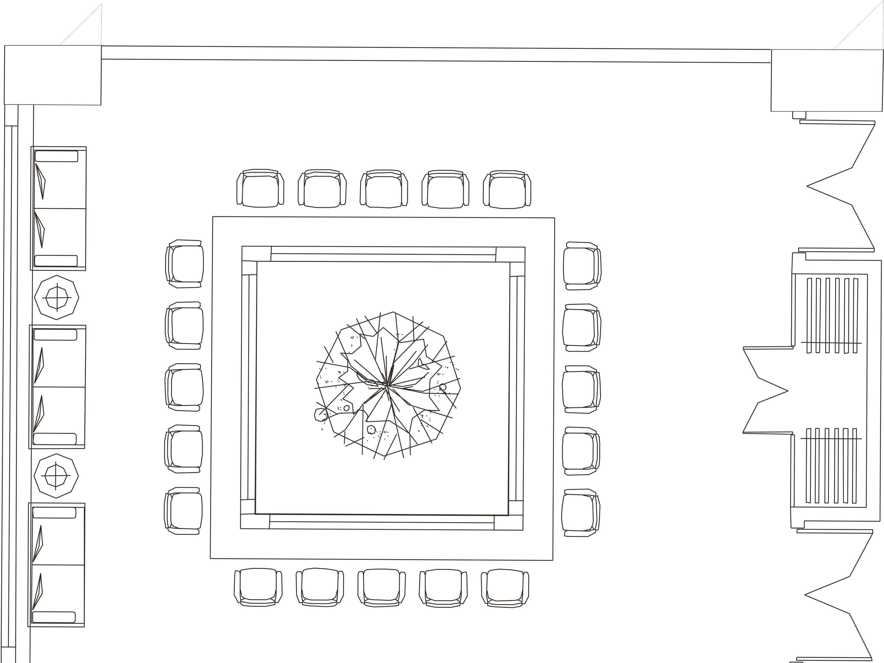 A floor plan with a central circular area surrounded by rectangular rooms, likely indicating a hotel layout.