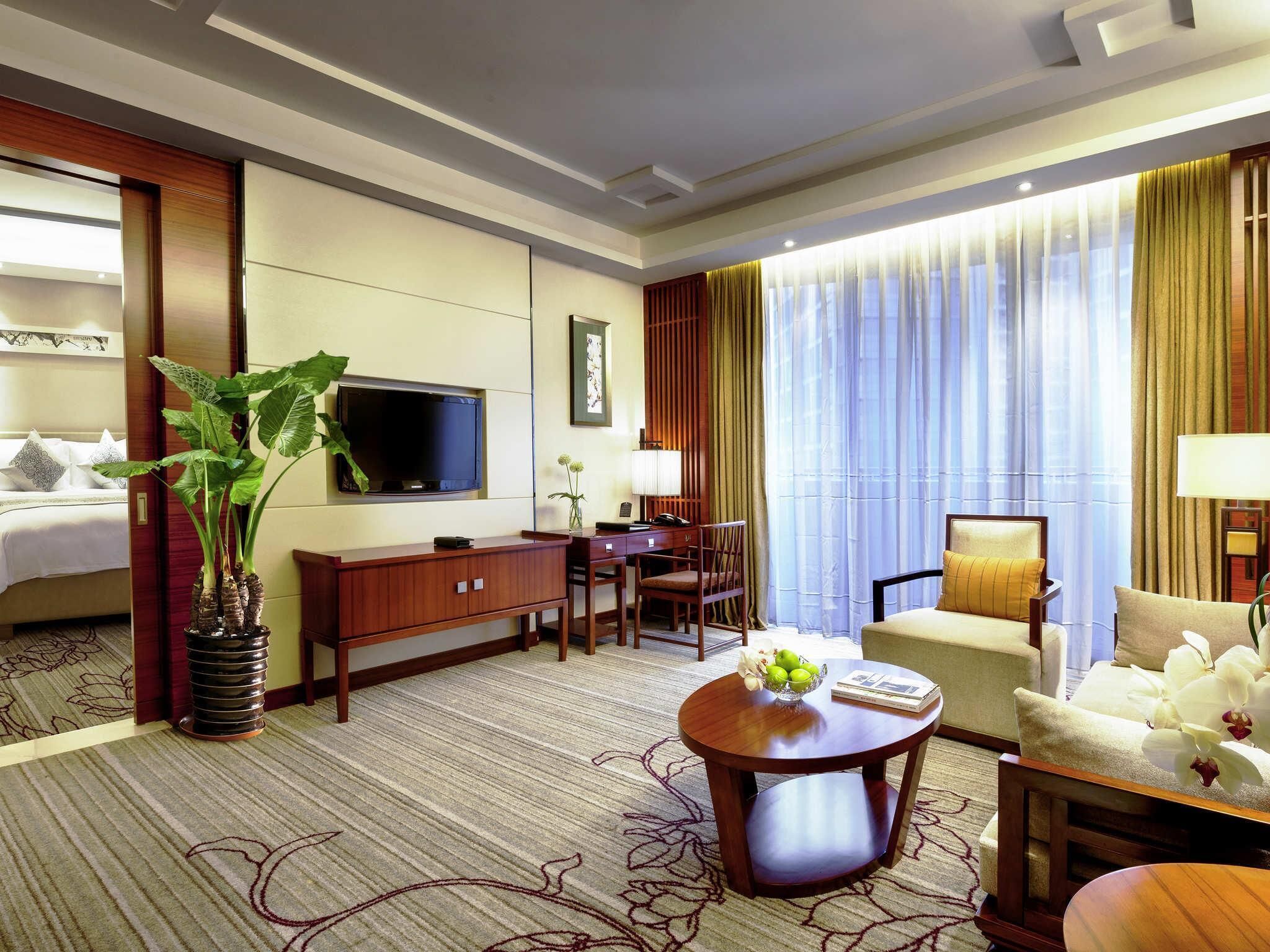 Deluxe Suite, 1 King Bed, Balcony | Down comforters, minibar, in-room safe, desk