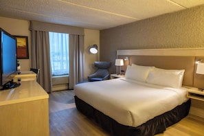 Premium bedding, pillow-top beds, desk, laptop workspace