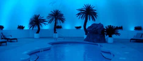 Indoor pool, open 9:00 AM to 9:00 PM, pool loungers