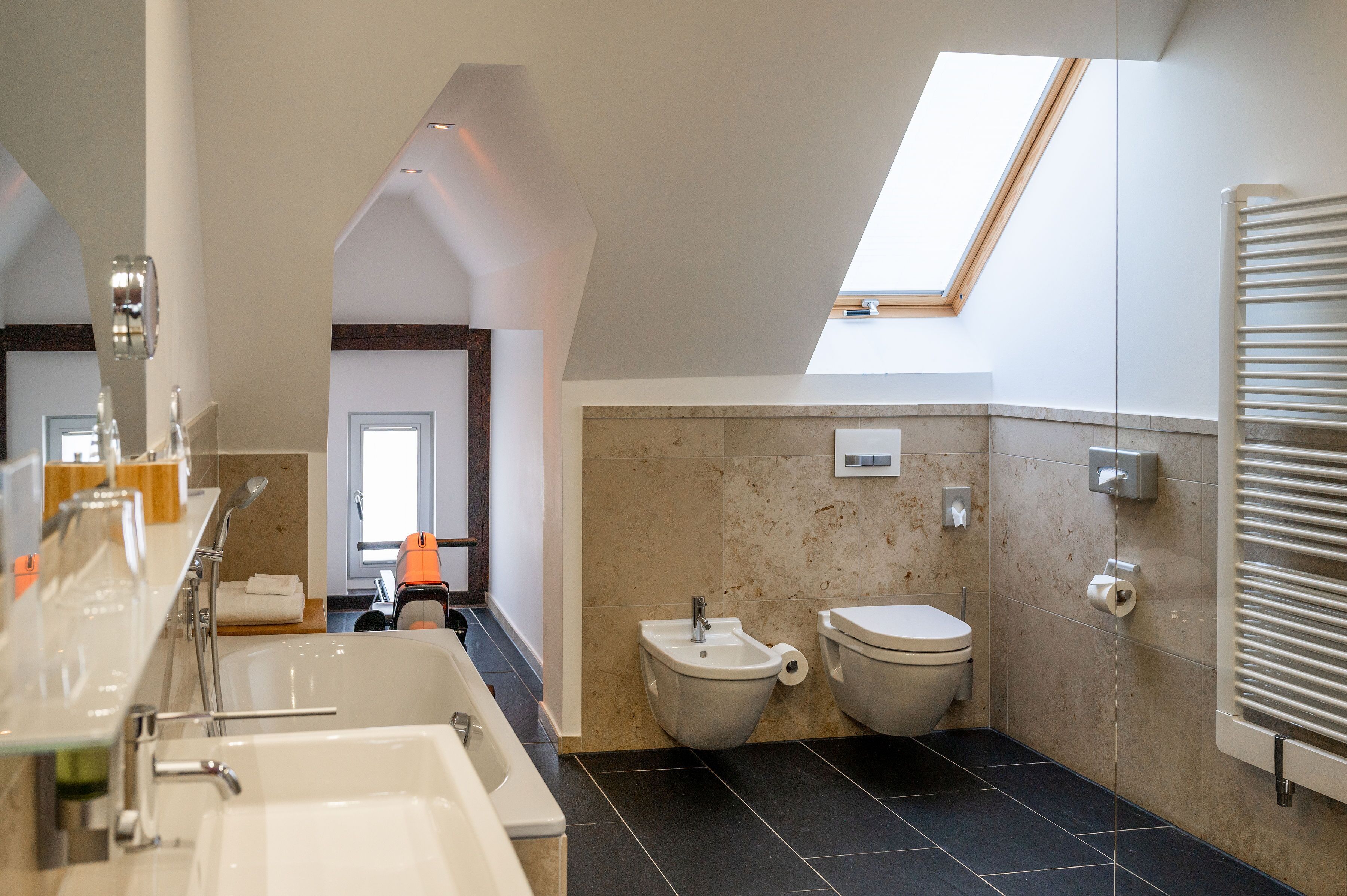 junior suite | bathroom | shower, free toiletries, hair dryer, towels