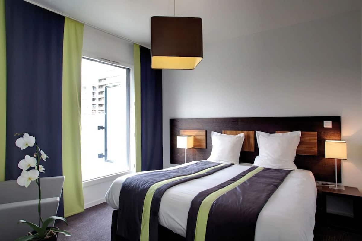 Desk, blackout drapes, iron/ironing board, free WiFi