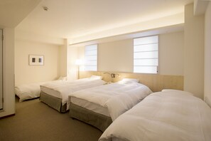 Superior Quadruple Room, Non Smoking | Down comforters, desk, blackout drapes, iron/ironing board - Shin-Osaka Station Hotel Annex (Osaka)