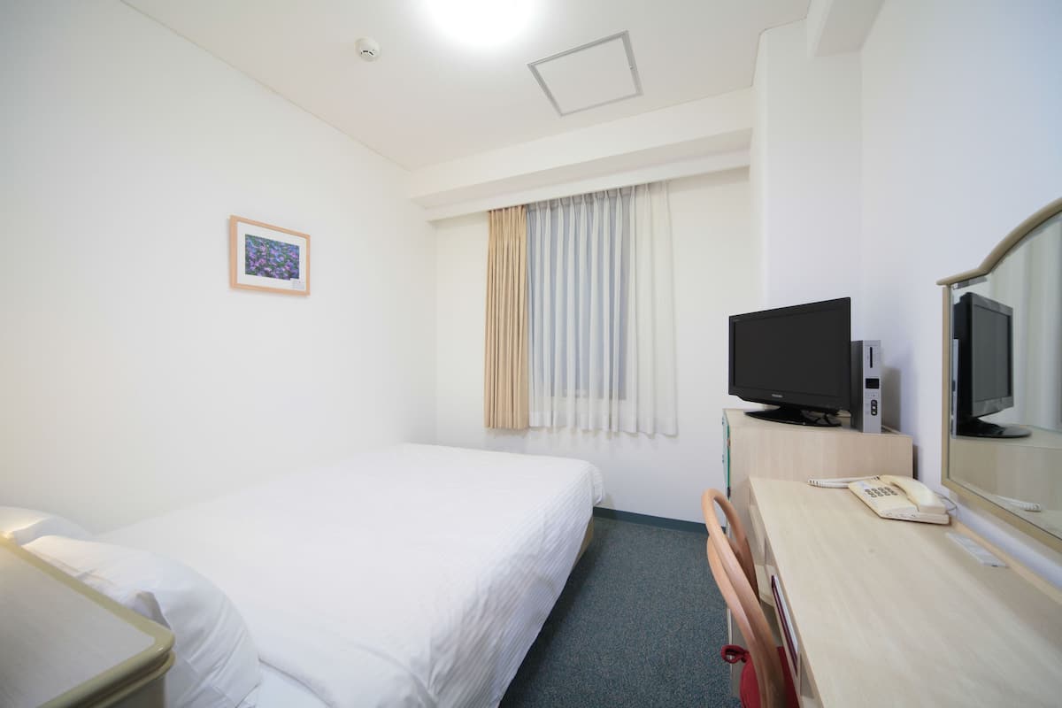 Down duvets, desk, blackout curtains, iron/ironing board (on request)