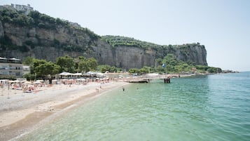 Private beach, beach towels, beach bar
