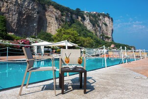 Seasonal outdoor pool, pool umbrellas, sun loungers
