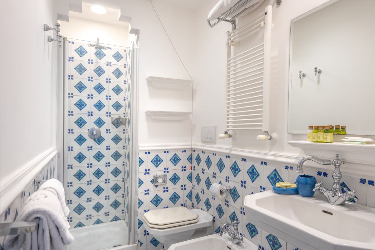 family suite, 1 bedroom, bathtub, sea view | frette italian sheets, premium bedding, minibar, in-room safe