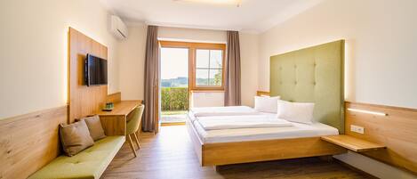 Hypo-allergenic bedding, down comforters, pillowtop beds, in-room safe