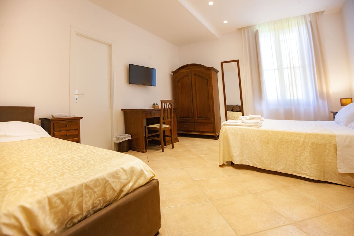 Standard Triple Room | 9 bedrooms, down duvets, Select Comfort beds, minibar