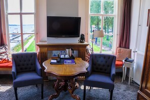 Luxe beddengoed, pillowtop-bedden, een kluis op de kamer