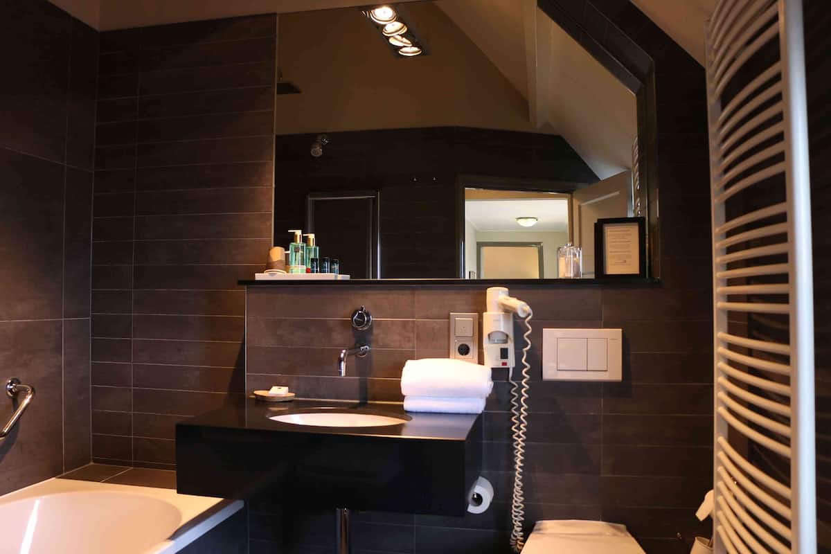 grand suite, harbor view, first floor (room 10, annex) | bathroom | designer toiletries, hair dryer, towels, soap