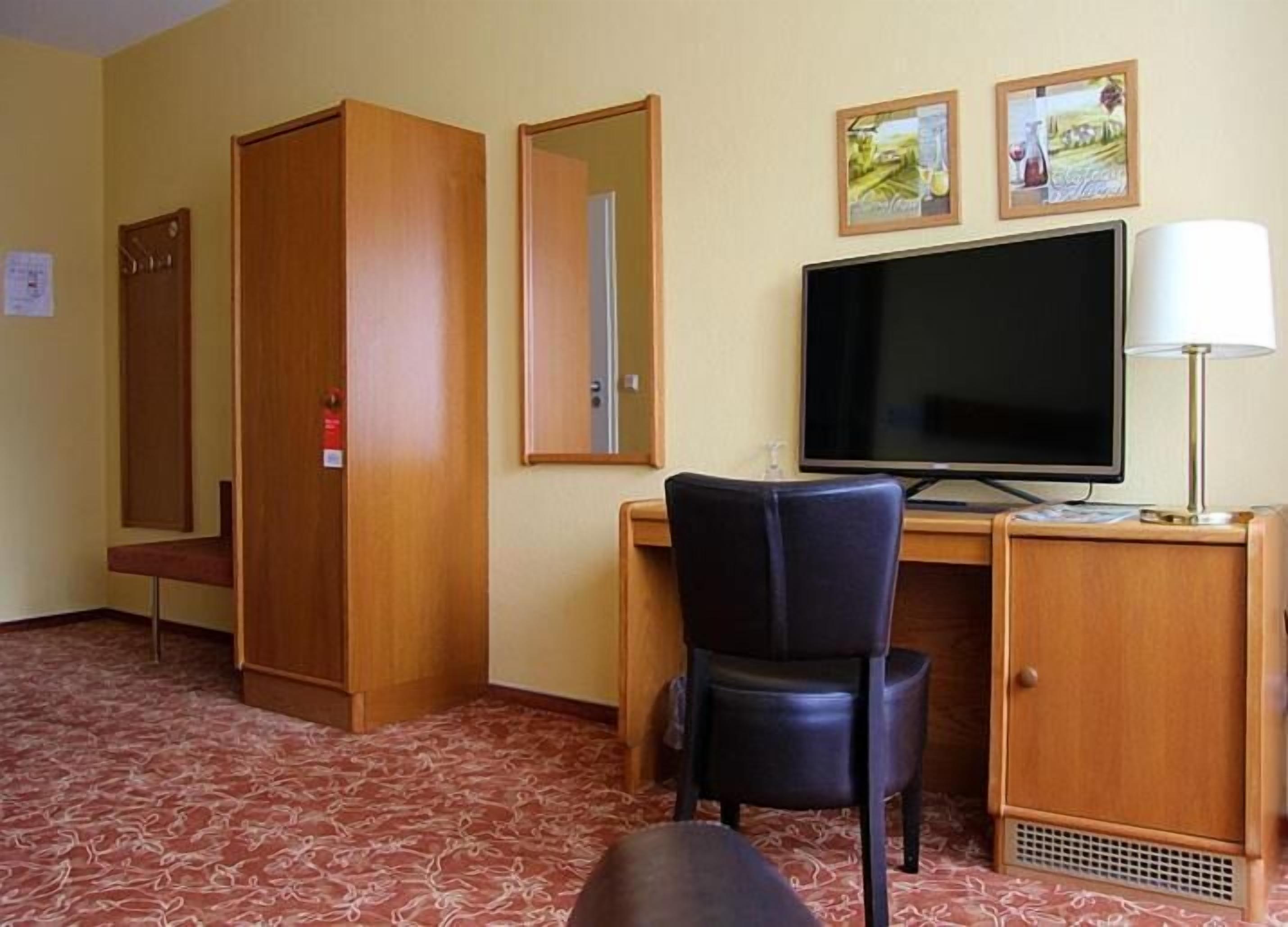 desk, blackout curtains, free cots/infant beds, rollaway beds