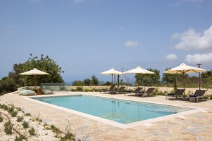 Asterope Villa | Pillowtop beds, minibar, in-room safe, individually decorated