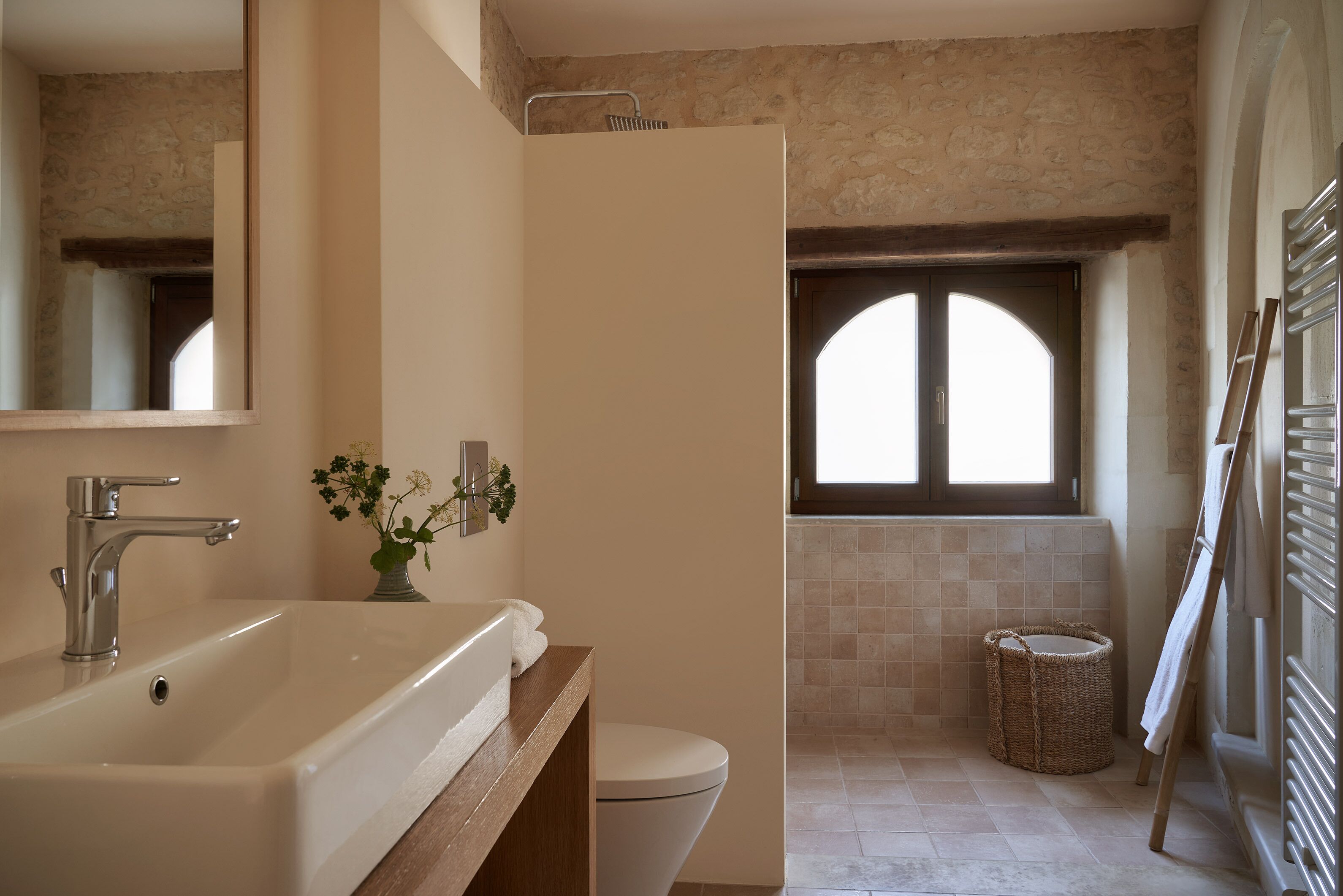 historic olive mill suite | bathroom | shower, rainfall showerhead, designer toiletries, hair dryer