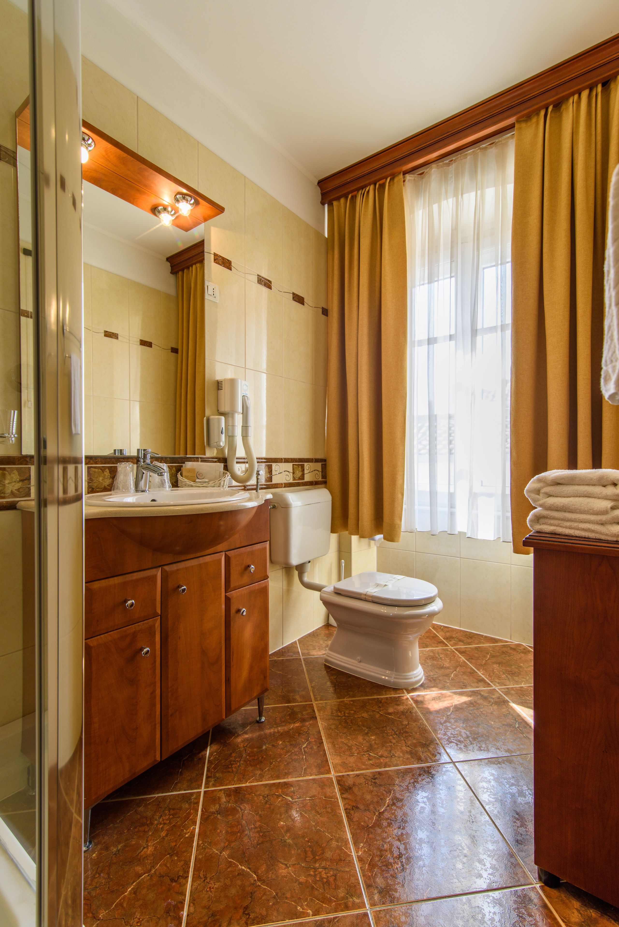 superior double room, city view | bathroom | shower, free toiletries, hair dryer, bathrobes