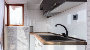  Luxury Triple Room, City View | Cocina privada
