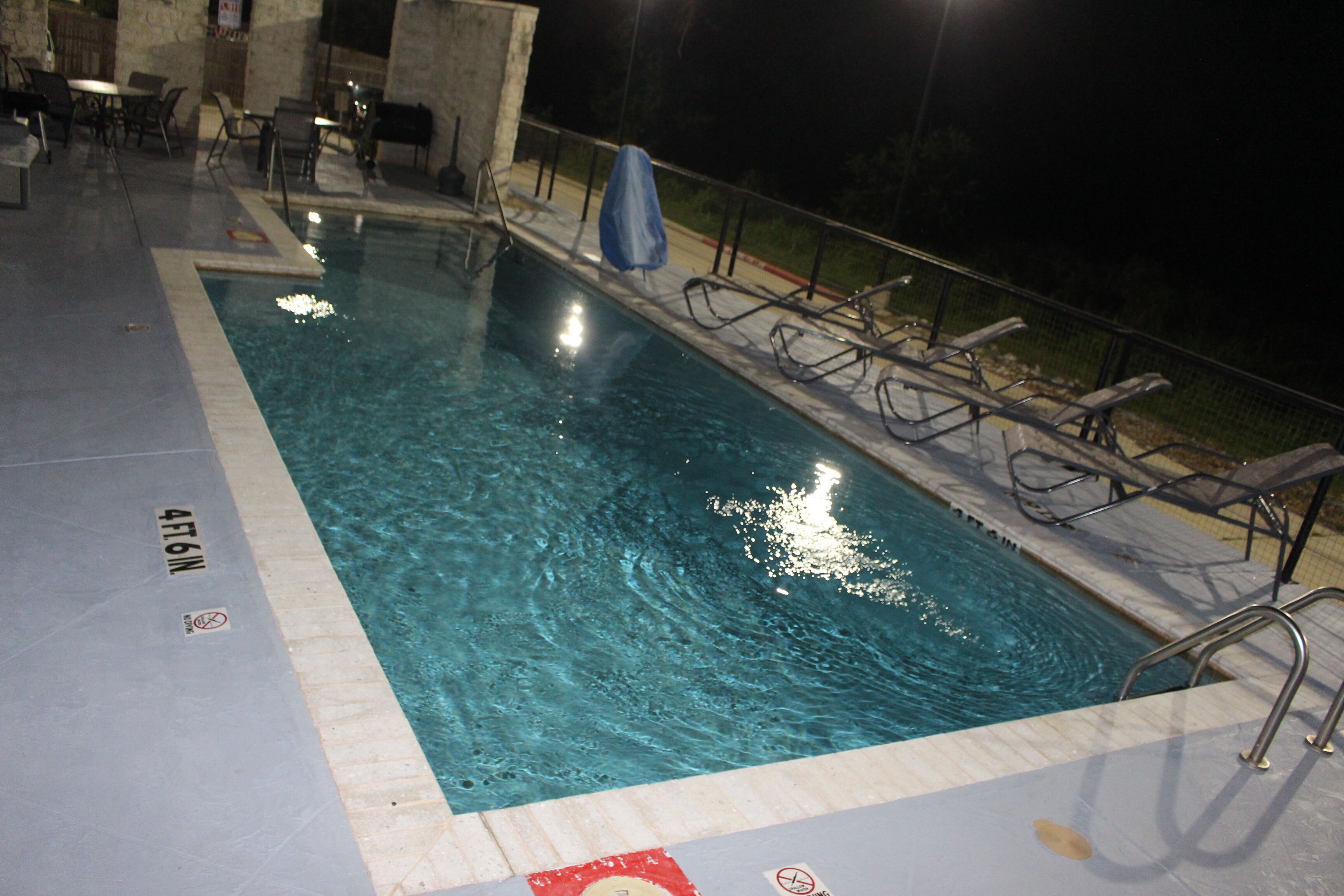 seasonal outdoor pool, pool umbrellas, pool loungers