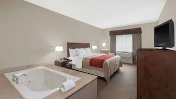 Room, 1 King Bed, Non Smoking, Jetted Tub | 1 bedroom, desk, blackout curtains, iron/ironing board