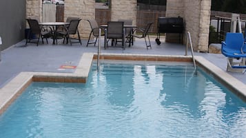 Seasonal outdoor pool, pool umbrellas, pool loungers