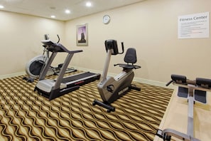 A fitness center with treadmills, an elliptical, and a stationary bike. - Holiday Inn Express Benicia by IHG (Benicia)