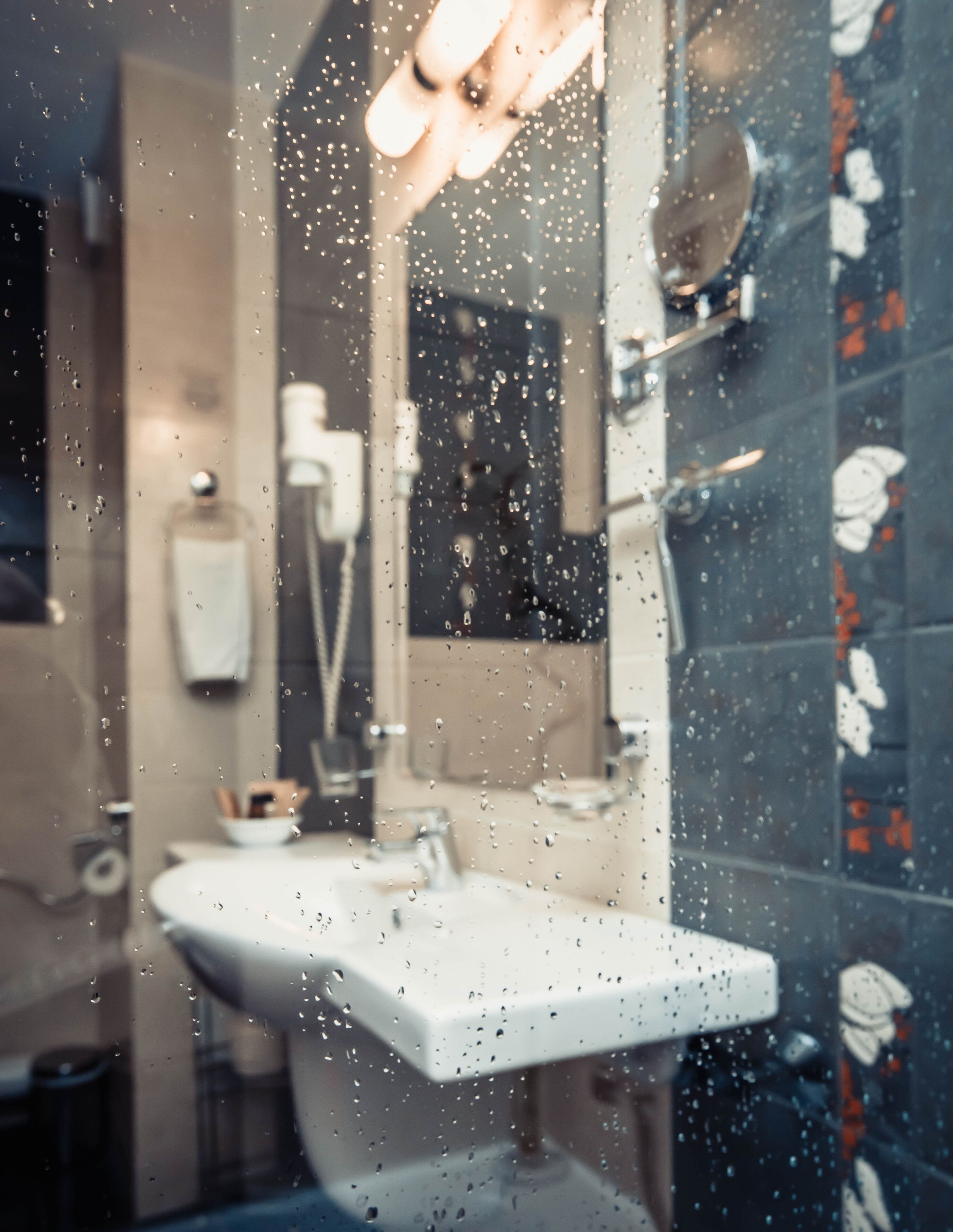 premium suite | bathroom | combined shower/bathtub, designer toiletries, hair dryer, bathrobes