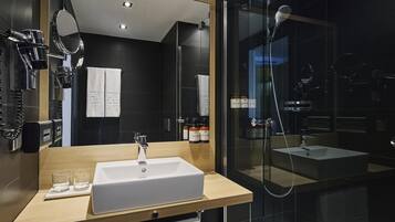 Shower, eco-friendly toiletries, hair dryer, towels