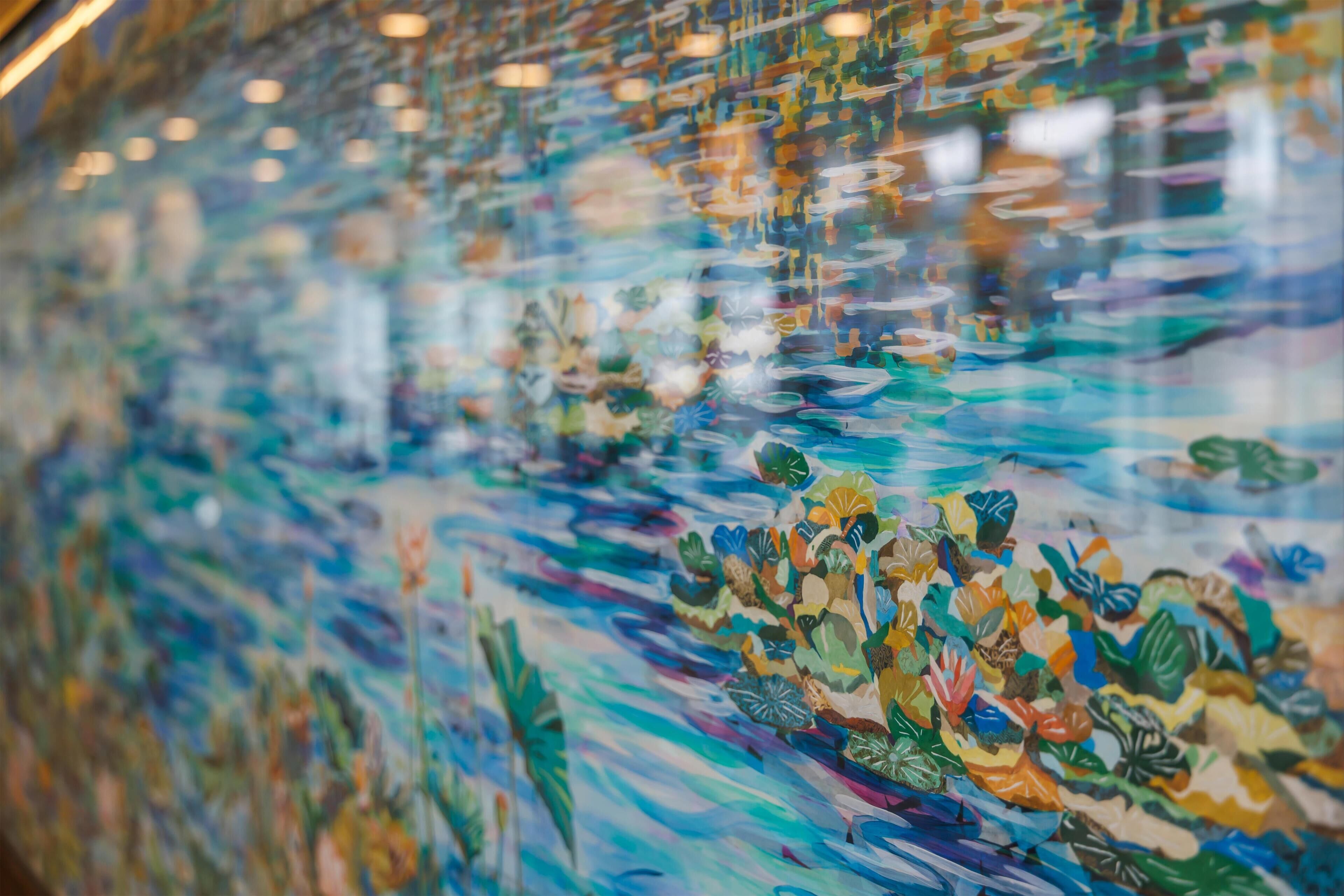 A colorful mosaic wall with a variety of shapes and patterns.