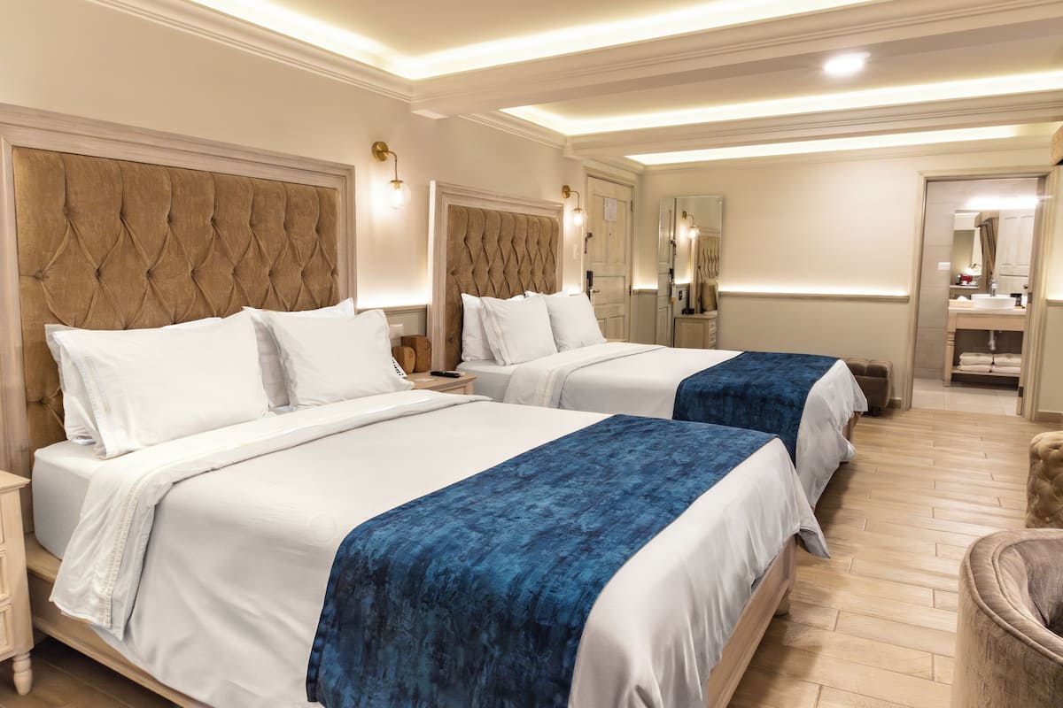 Suite, 2 Queen Beds | In-room safe, blackout drapes, soundproofing, WiFi (free)